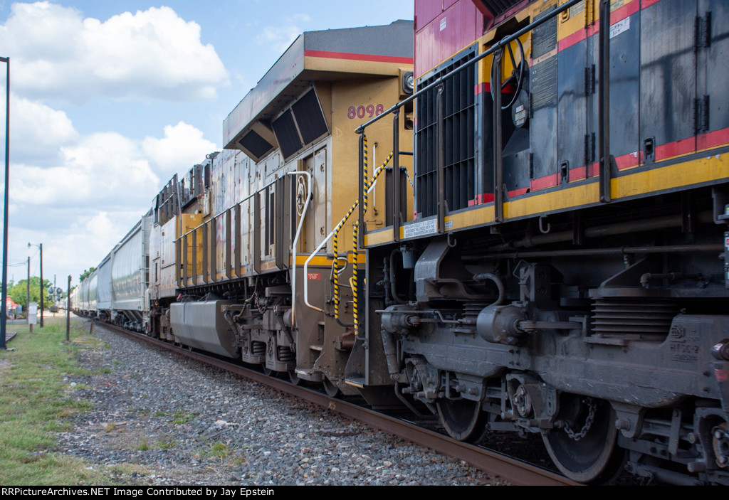 UP 8098 trails on a westbound manifest